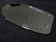 A frameless bevel edged mirror