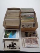 Two boxes containing a quantity of early 20th century and later postcards to include birthday