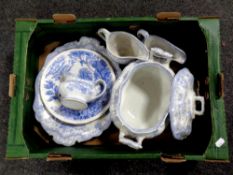 A box containing seven pieces of 19th century blue and white dinner ware
