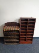 A pine organ stool with shelves beneath together with a stained plywood sixteen hole document shelf