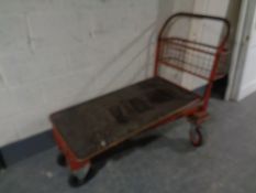 A large flatbed trolley (red)