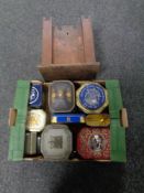 An Edwardian oak table cabinet in the form of a castle together with a box containing vintage tins