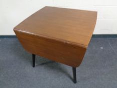 A 20th century teak G Plan drop leaf table