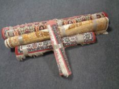 Four machine made Persian design rugs