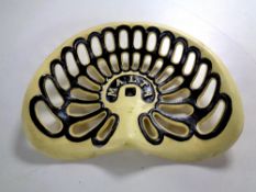 A cast iron Malta tractor seat