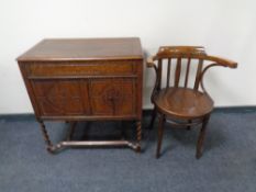 An Edwardian oak barley twist gramophone cabinet together with a Bentwood armchair