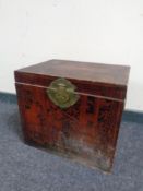 A Chinese style chest with brass mounts