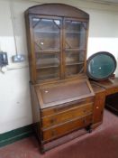 An Edwardian oak bureau bookcase