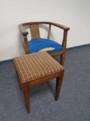 A continental beech wood tub chair together with a tapestry upholstered dressing table stool