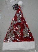 A box containing a quantity of Christmas sequin hats