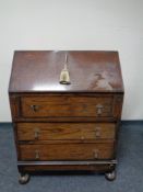 A 20th century oak bureau