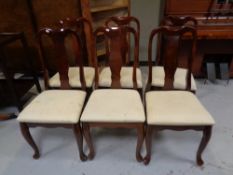 A set of six contemporary Queen Anne style dining chairs