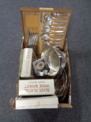 A box containing assorted plated wares to include lion mask handled punch bowl with ladle,