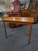 A mid 20th century Scandinavian teak dining table