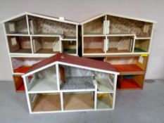 Three 20th century dolls houses