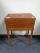 An antique campaign style writing box on stand