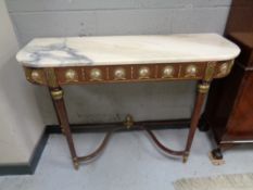 A French style marble topped console table with brass mounts