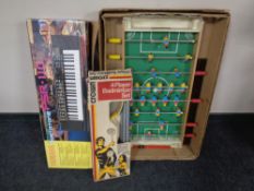 A Yamaha Portatone PSR-110 electric keyboard with stand,