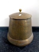 An eastern brass lidded pot