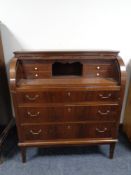A 20th century barrel fronted writing bureau
