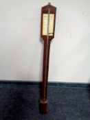 An antique stick barometer