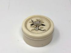 A fine Japanese circular inlaid ivory dressing table pot, diameter 3 cm.