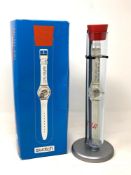 A Swatch Genetic Code watch in box.
