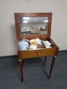A continental mahogany brass inlaid work table on tapered legs
