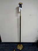 A brass rise and fall standard lamp (continental wiring)