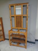 A 20th century pine mirrored hall stand