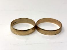 Two 9ct gold band rings. CONDITION REPORT: 3.