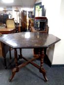 An Edwardian oak octagonal occasional table