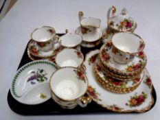 A tray of twenty two pieces of Royal Albert Old Country Roses china and a further Portmeirion dish