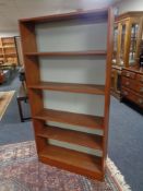 A set of 20th century teak open bookshelves
