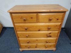 A pine six drawer chest