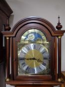 A contemporary longcase clock with moon phase dial (as found)