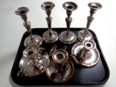 A tray of two pairs of plated candlesticks together with four further candlesticks with snuffers.