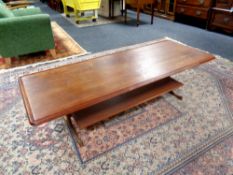 A 20th century Danish teak coffee table with under shelf