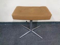 A mid 20th century adjustable dressing table stool on chrome base