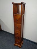 An Indonesian narrow five drawer chest.