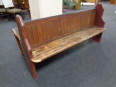 A pitch pine church pew,