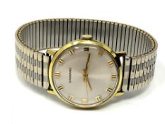 A gent's gold plated Garrard wristwatch.
