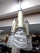 An Art Deco three-way chromed light fitting with glass shades