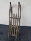 A vintage Davos wooden sledge