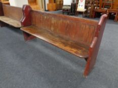 A pitch pine church pew,