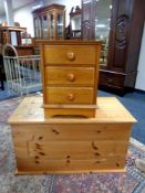 A pine three drawer chest and a stripped pine blanket box