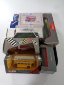 A tray containing eight Corgi die cast buses and trams (boxed)