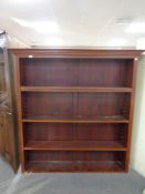 A set of antique mahogany and pine open bookshelves