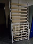 A 3' Victorian style white bed frame