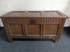A George III panelled oak coffer